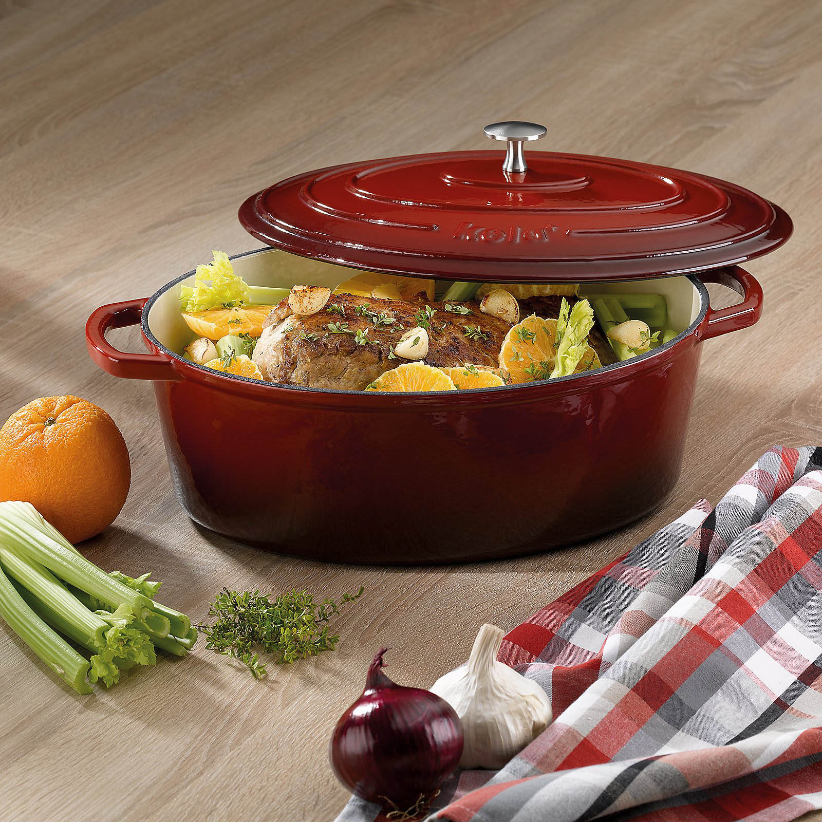 KELA Bräter Cocotte CALIDO Gusseisen emailliert 33 cm oval 6 Liter rot INDUKTION