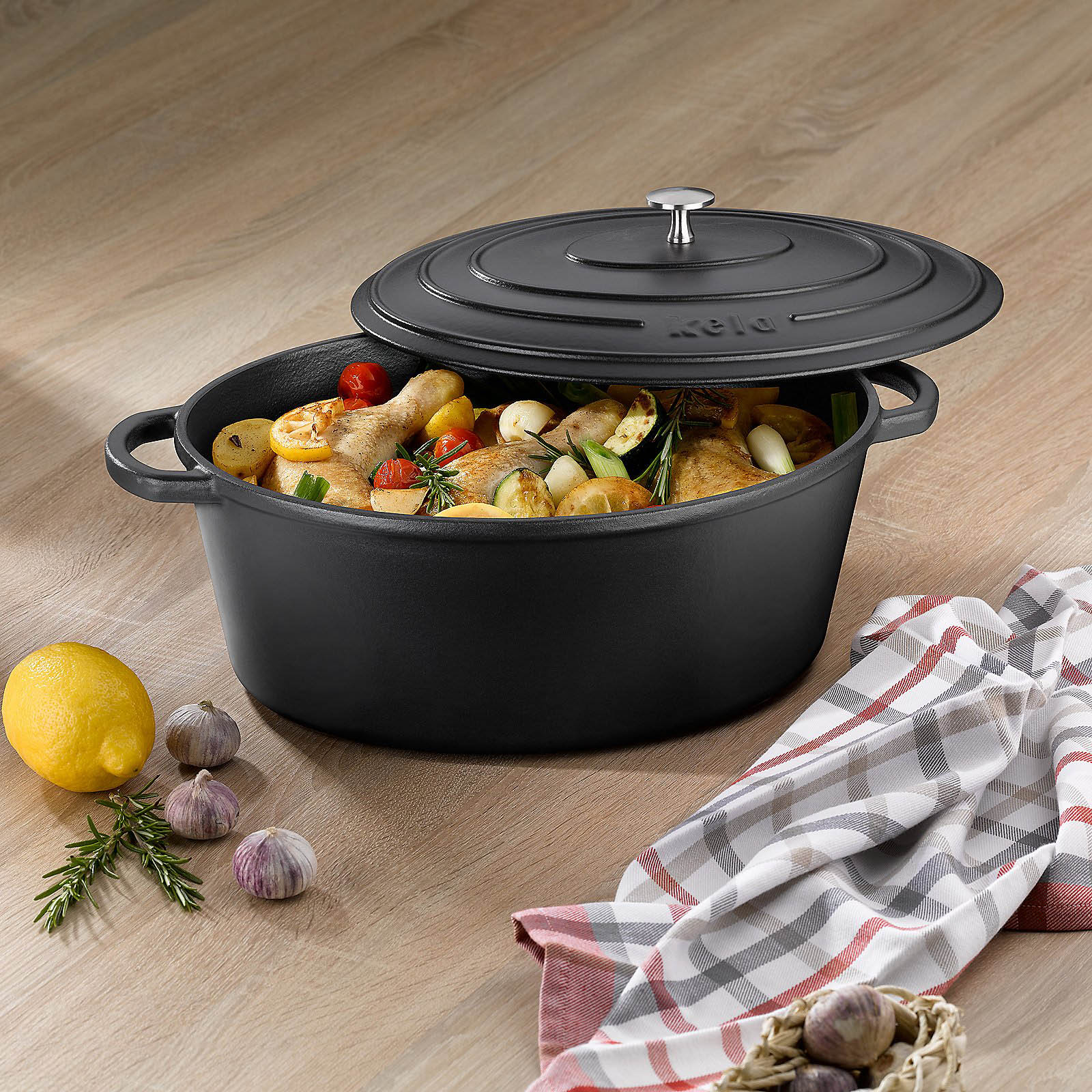 KELA Bräter Cocotte CALIDO Gusseisen emailliert 33 cm oval 6 Liter schwarz INDUKTION